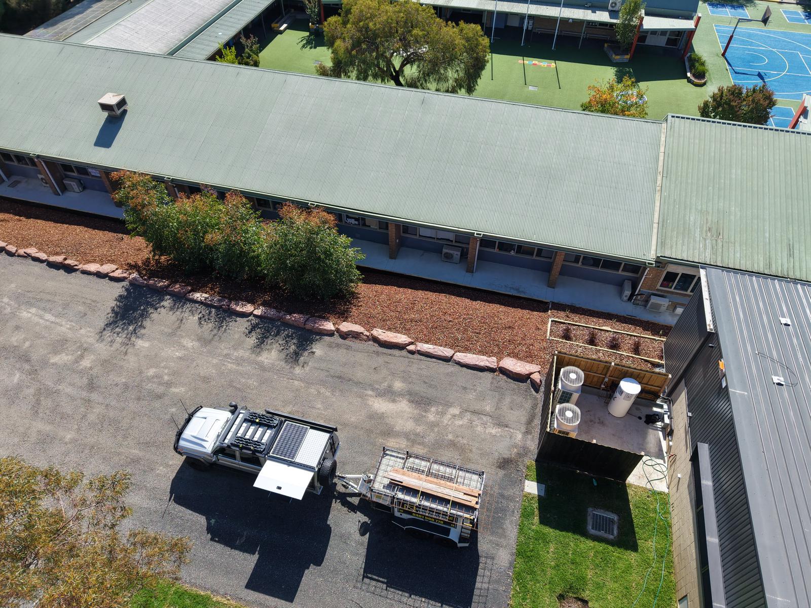 Aerial of a sandstone-edged garden bed