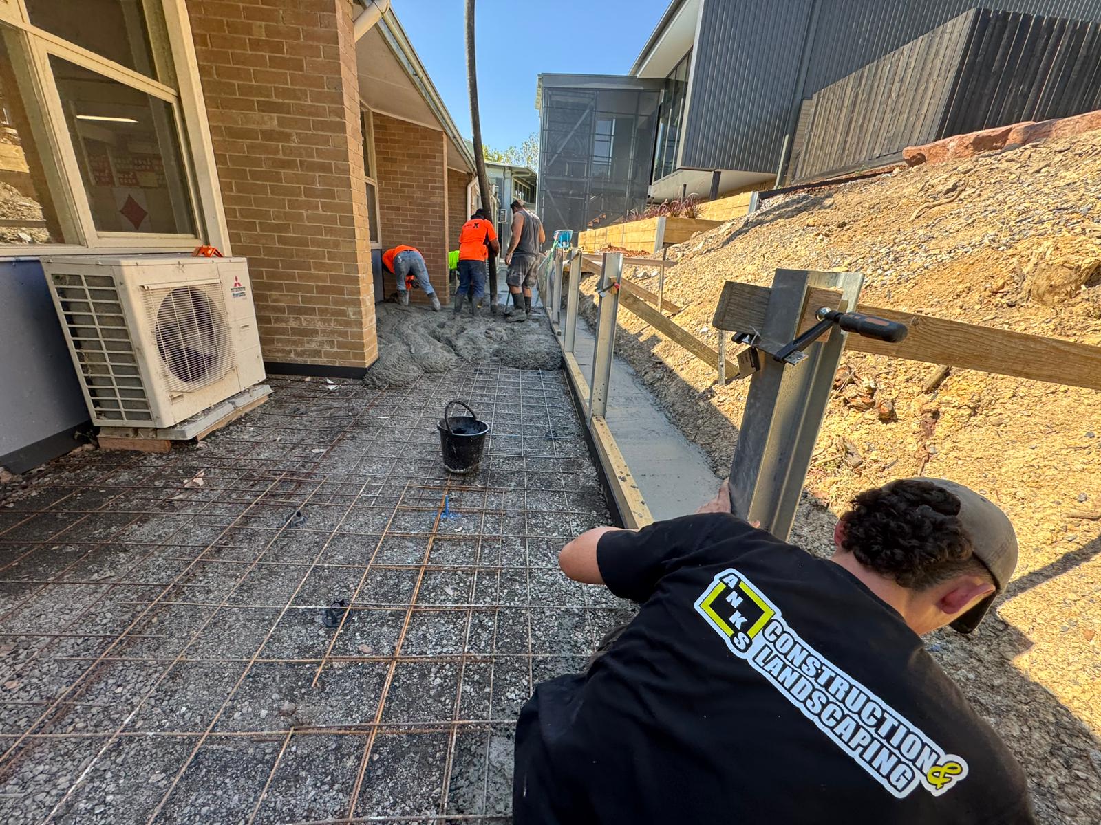 Concrete pour over rebar for a pathway at St James Vermont
