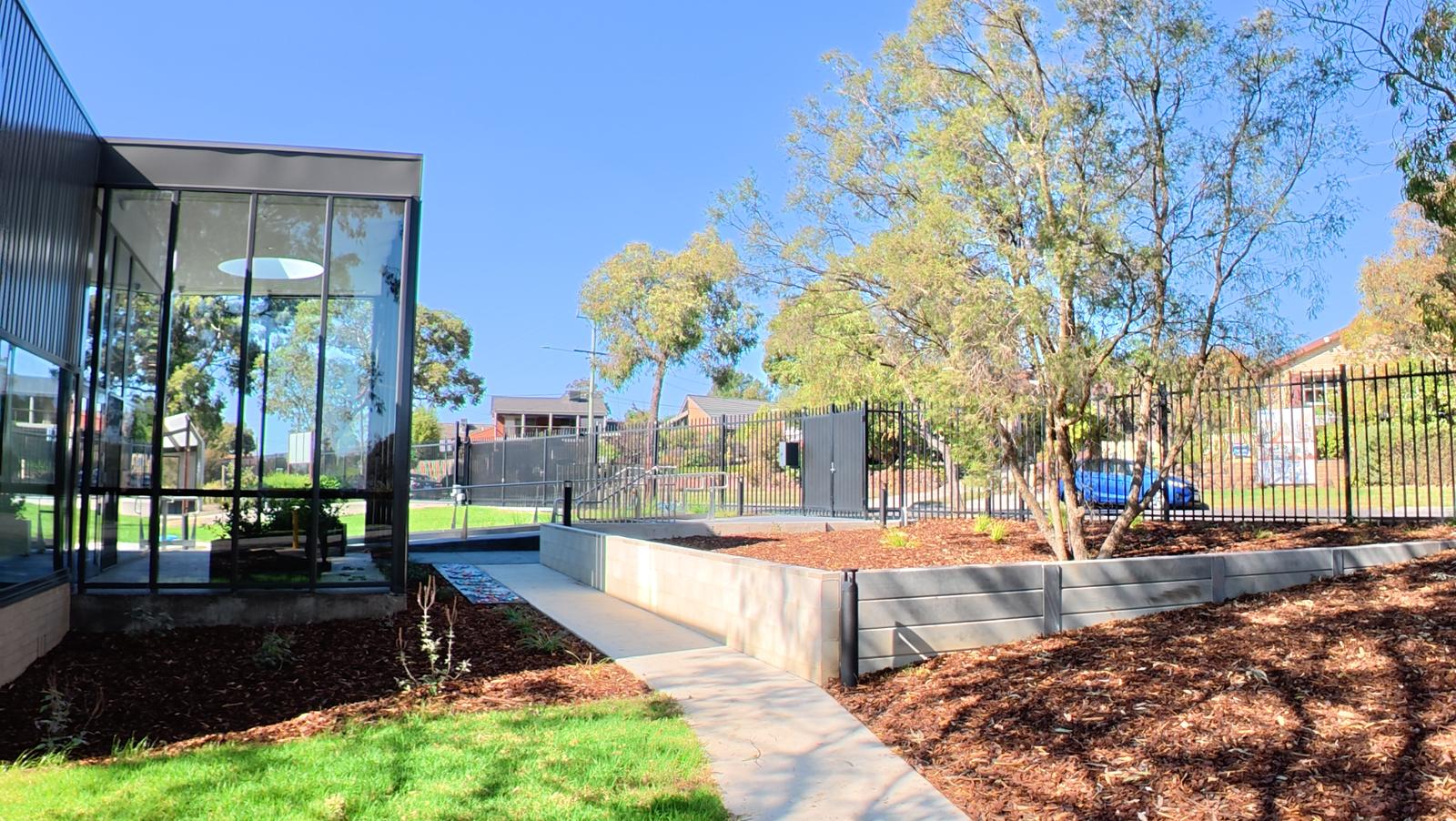 Glazed classroom with garden pathways