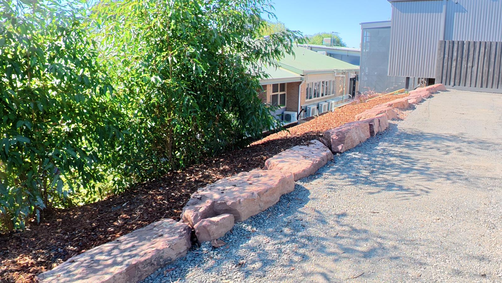 Sandstone boulder retaining wall